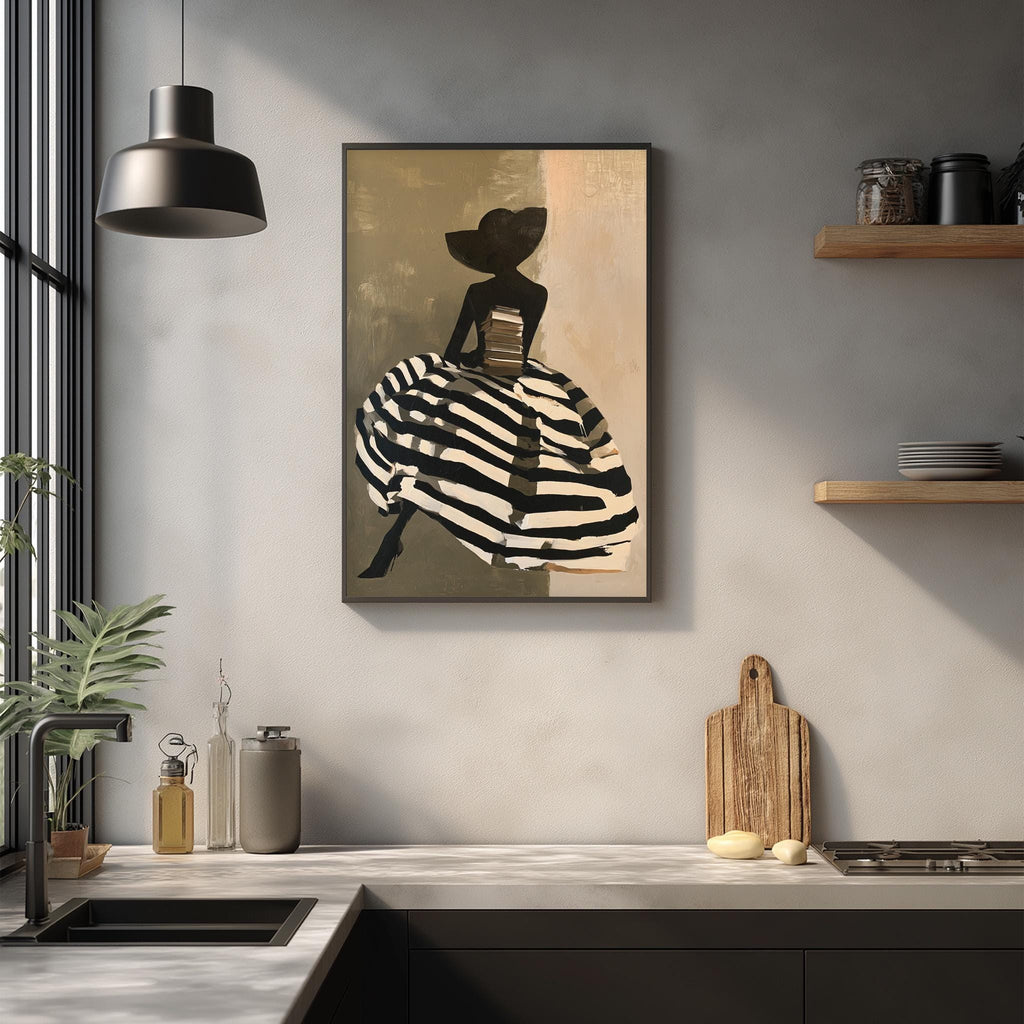 a kitchen counter with a framed artwork of a woman in a striped dress hanging on the wall above it. The kitchen counter also has various items such as a cutting board, a bottle, and a vase.