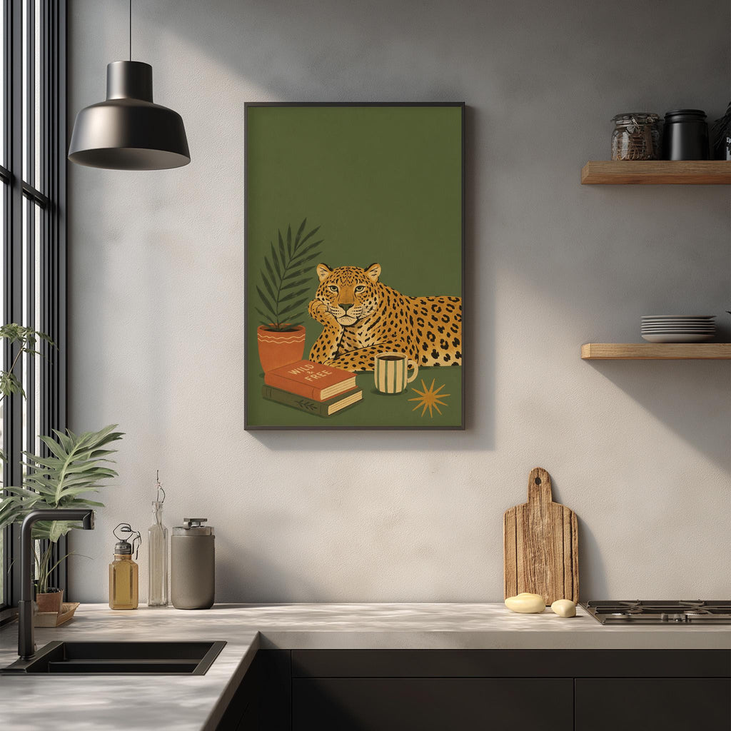 a kitchen counter with various items, including a framed illustration of a leopard, a potted plant, a wooden cutting board, and a shelf with jars.