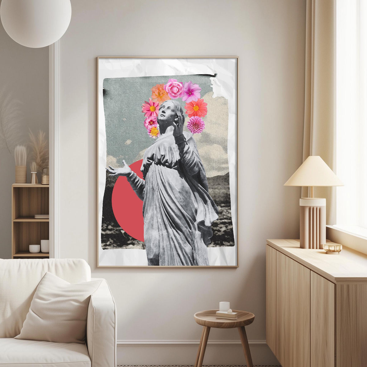 a large framed artwork depicting a woman with a floral headpiece, standing in a minimalist setting with a white couch and a wooden side table.
