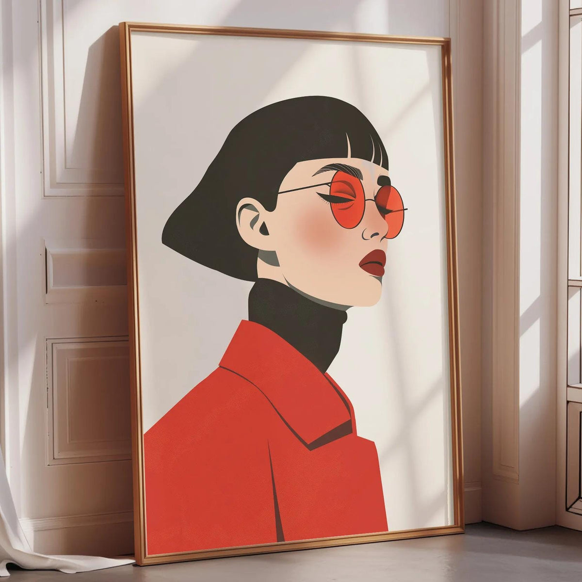A framed illustration of a woman wearing a red coat and sunglasses is displayed on a wall.