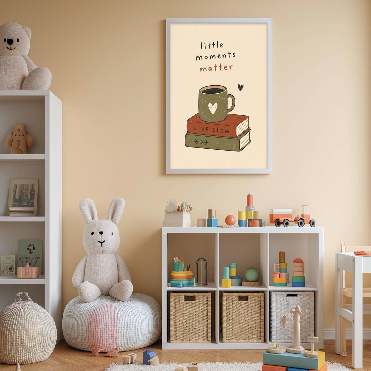 A cozy children's room with a bookshelf, stuffed animals, and a toy train. The room has a warm, inviting atmosphere with a framed poster on the wall that reads "little moments matter" and features an illustration of a cup of coffee.