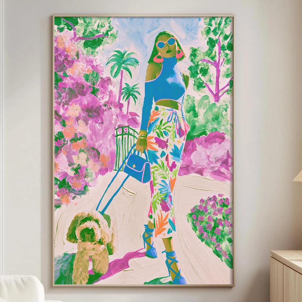 a large, colorful painting of a woman walking a dog in a tropical garden, hanging on a wall in a living room.