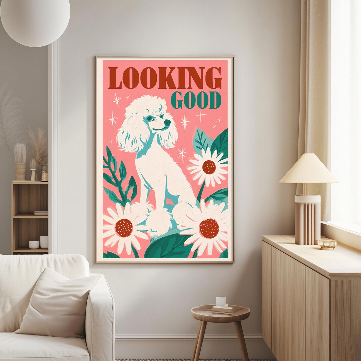 a poster of a poodle with flowers on a pink background, hanging on a wall in a living room.