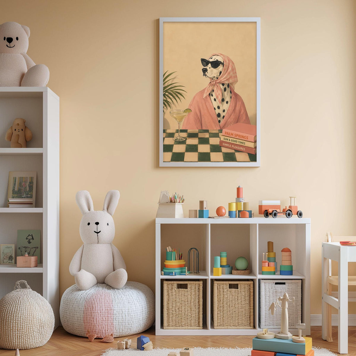 A cozy children's room with a white bookshelf, a stuffed rabbit, a toy train, and a framed picture of a Dalmatian dog wearing sunglasses and a pink scarf.