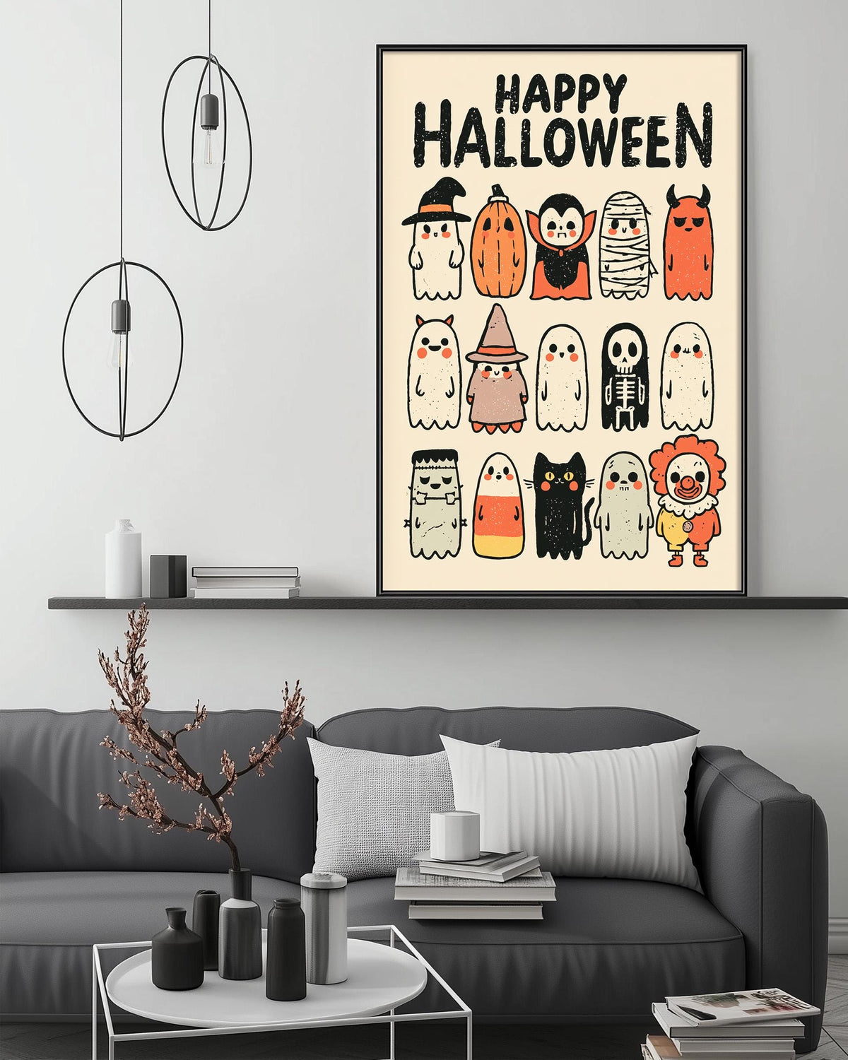 a living room with a gray couch, a coffee table, and a framed poster of various Halloween-themed characters on the wall.
