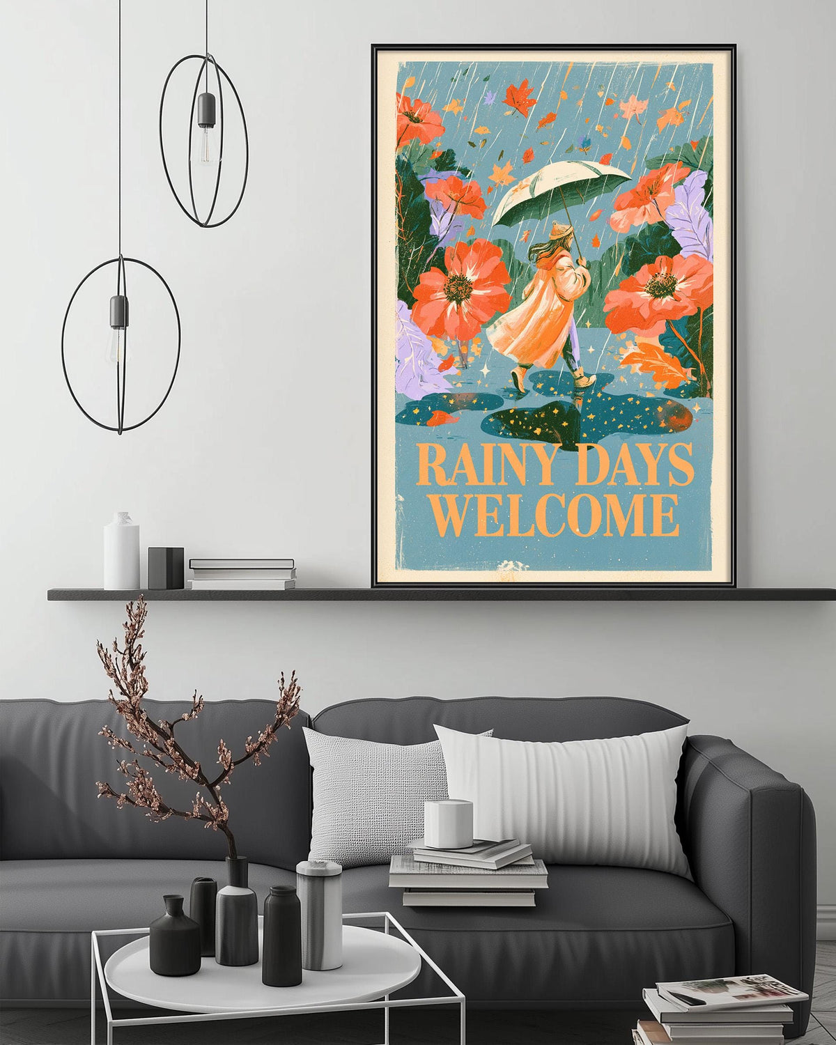 a cozy living room with a gray couch, a coffee table, and a framed poster of a woman holding an umbrella and surrounded by flowers. The poster has the text "Rainy days welcome" written on it.