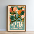 The image is a framed poster with a colorful illustration of leaves and flowers, along with the text "LITTLE THINGS BECOME BIG THINGS" displayed prominently.