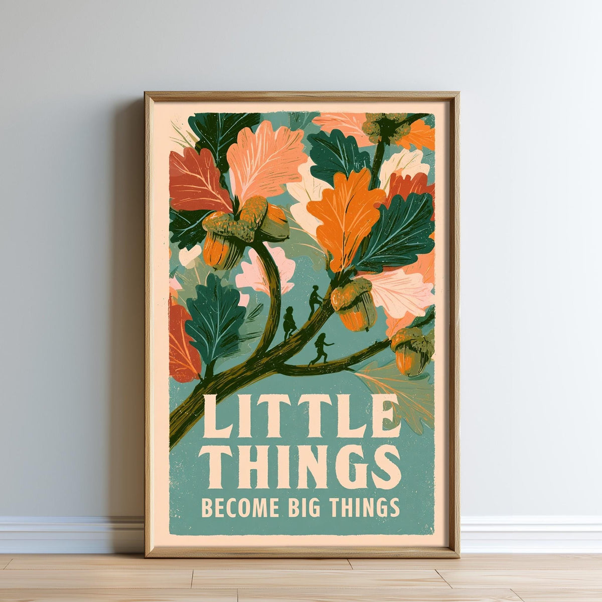 The image is a framed poster with a colorful illustration of leaves and flowers, along with the text "LITTLE THINGS BECOME BIG THINGS" displayed prominently.