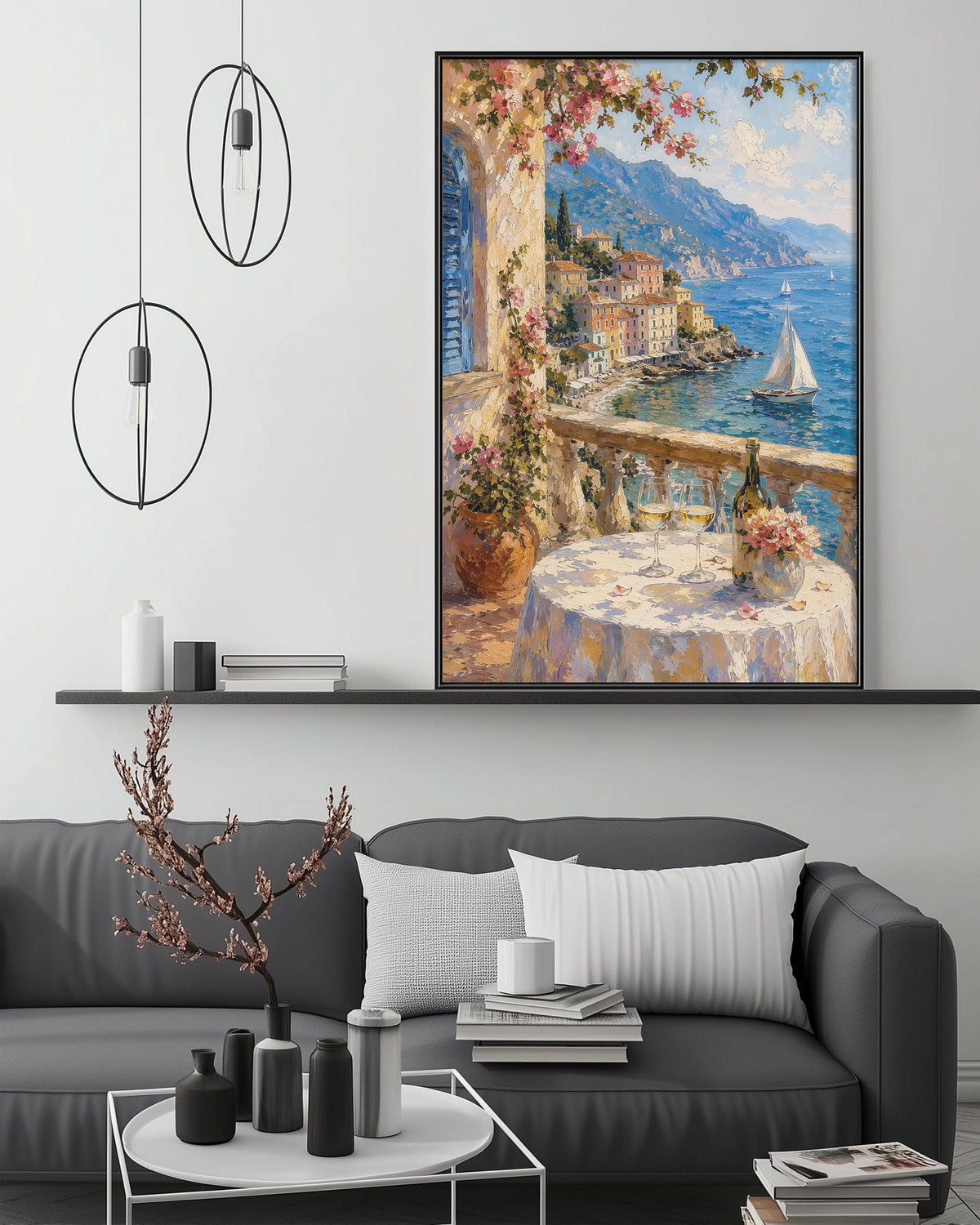 a living room with a large painting of a coastal town with a sailboat on the water, a table with a vase of flowers, and a bookshelf with various decorative items.
