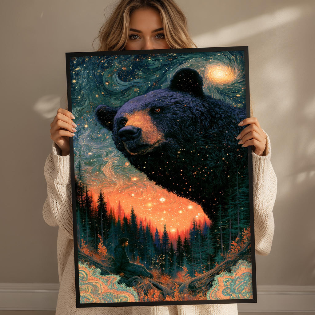 A woman holds up a framed painting depicting a large, black bear against a starry night sky with a forest landscape in the background.