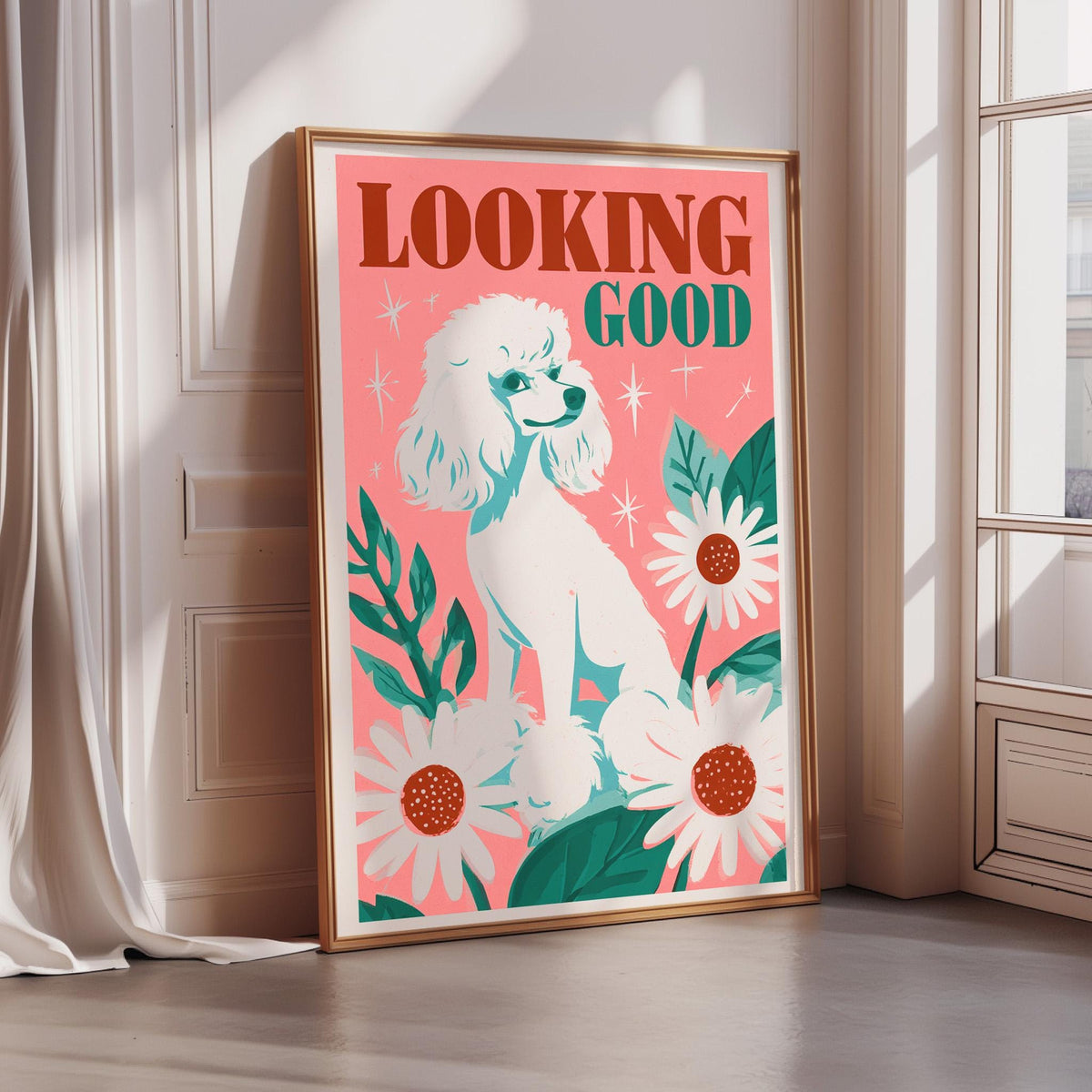 A framed poster with a white poodle and flowers on a pink background, with the text "Looking Good" written on it.