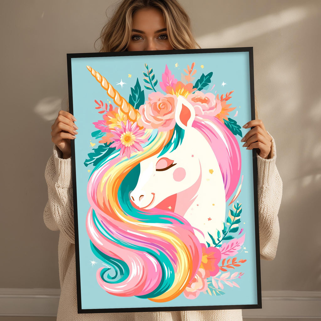 A woman holding a framed picture of a unicorn with a colorful, whimsical design featuring flowers, leaves, and a rainbow-colored mane.