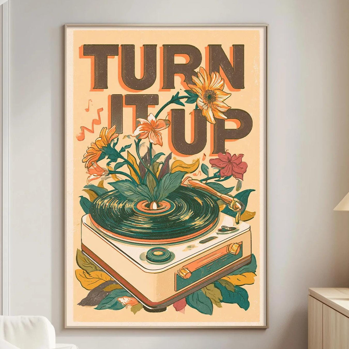 a poster with a record player and flowers on a wall in a living room.