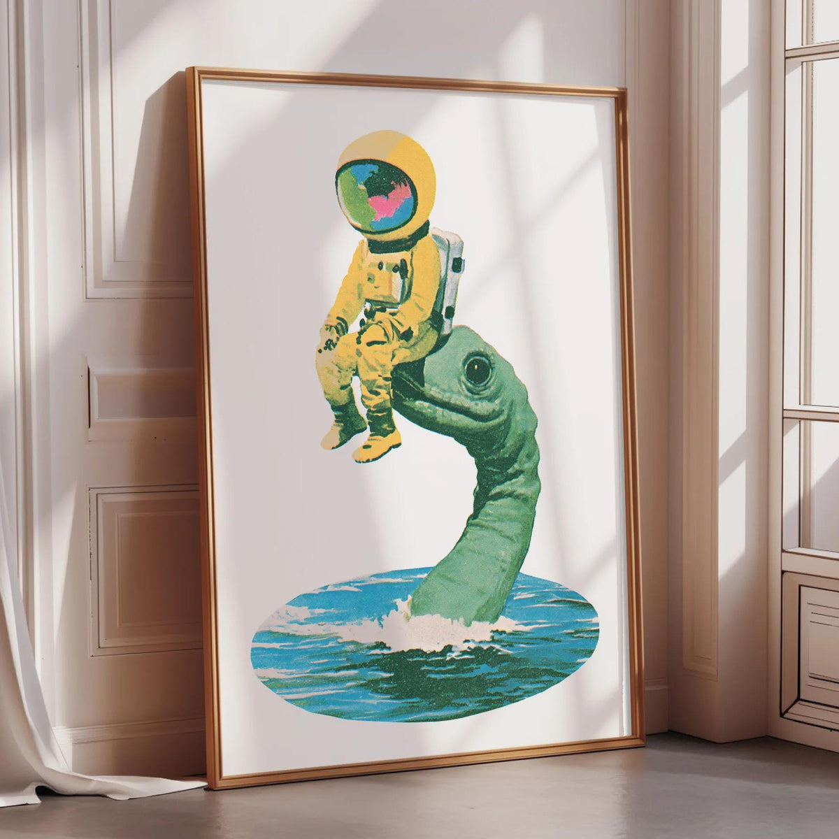 a framed artwork depicting an astronaut in a yellow suit sitting on a green dinosaur-like creature, which appears to be a representation of a sea turtle.
