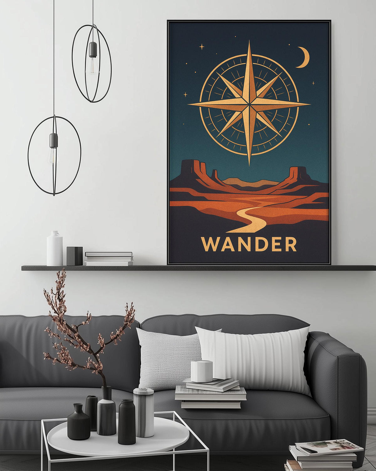 a modern living room with a gray sofa, a coffee table, and a large framed poster of a desert landscape with a compass and the word "Wander" written on it.