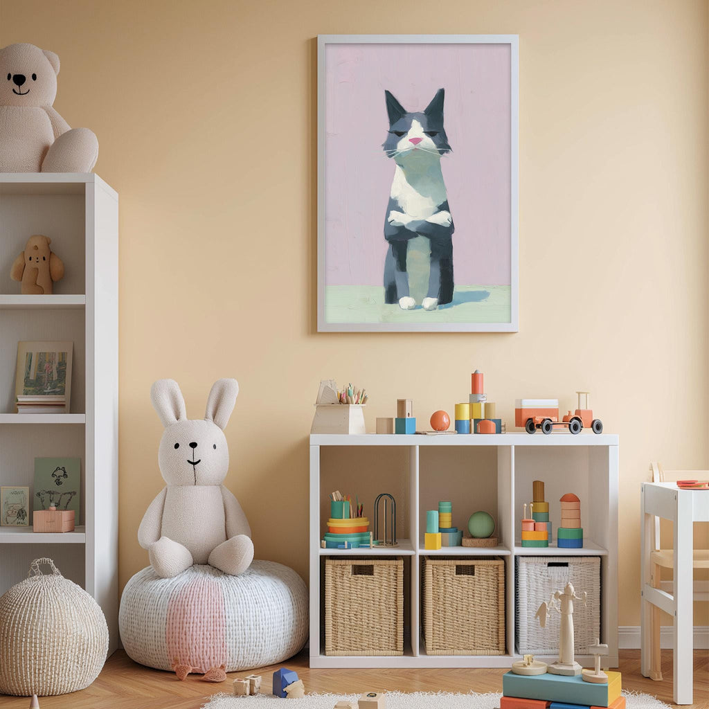 A child's bedroom with a white bookshelf, a stuffed rabbit, a framed picture of a cat, and a toy train set.