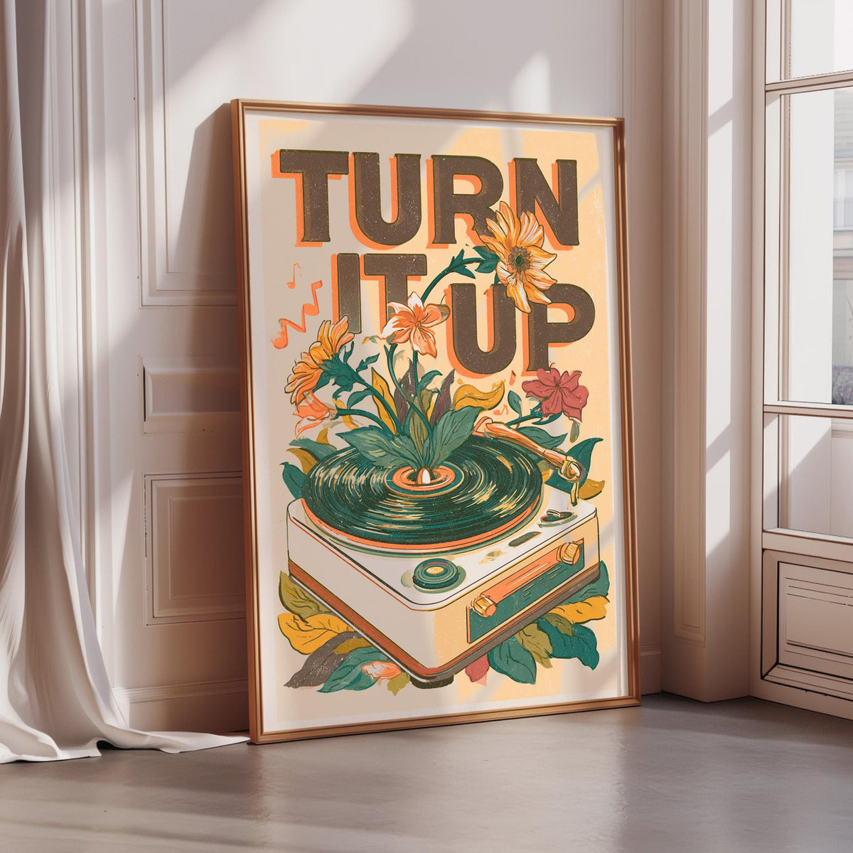 a framed poster with a vibrant illustration of a turntable surrounded by flowers and leaves, along with the text "TURN IT UP" prominently displayed.