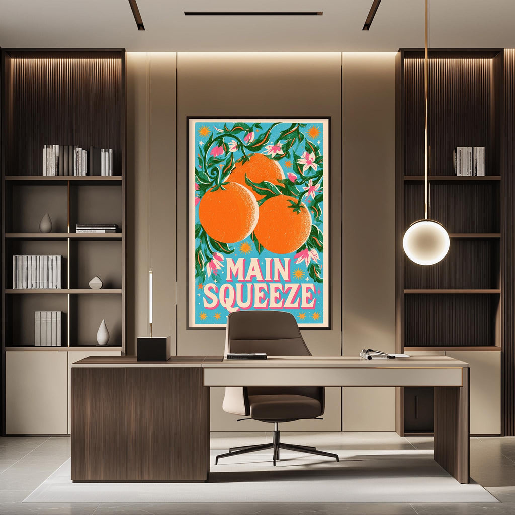 a modern office space with a large framed poster of oranges on the wall, a desk with a chair, and a bookshelf.
