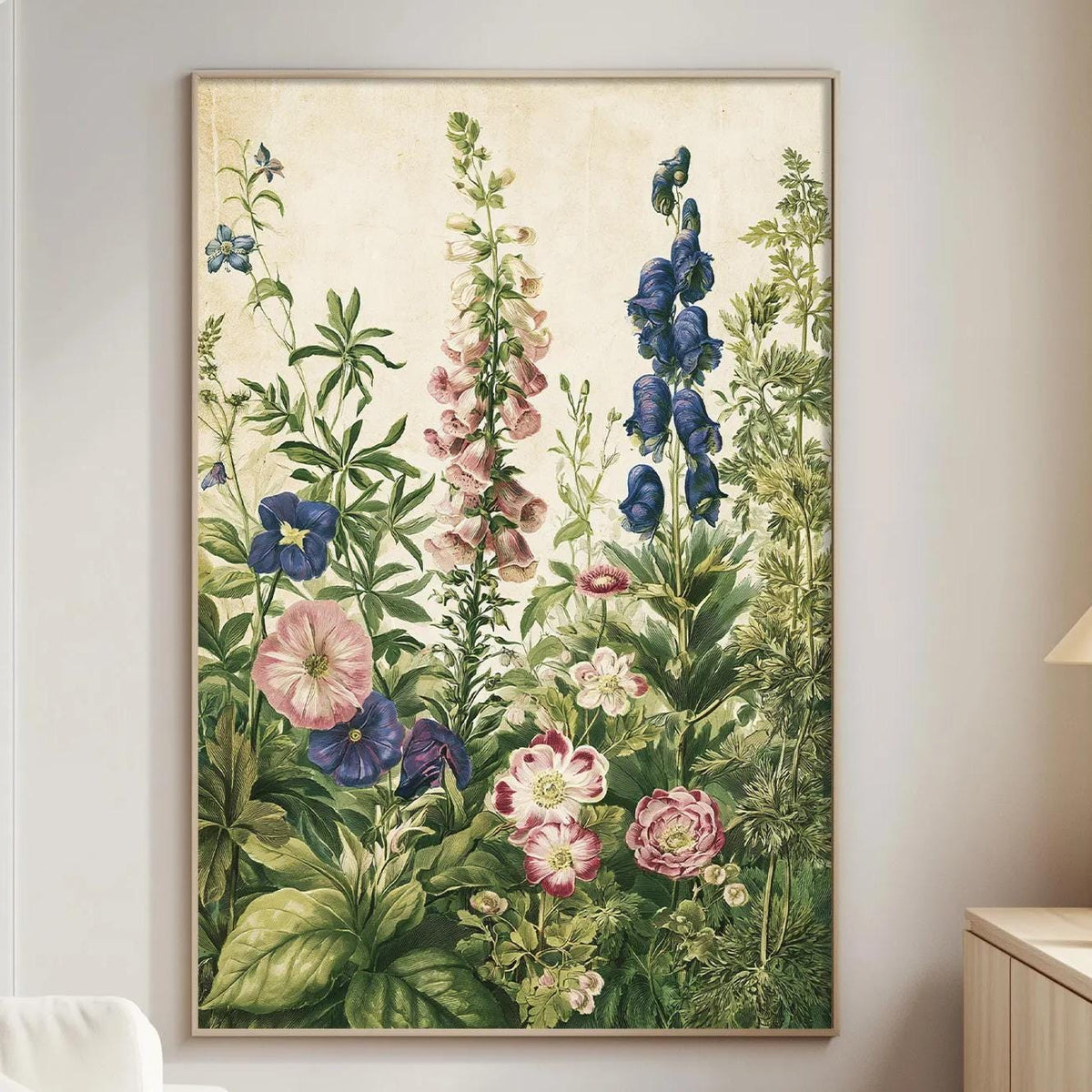 a large floral painting hanging on a wall in a living room, depicting a lush garden scene with various flowers and plants.