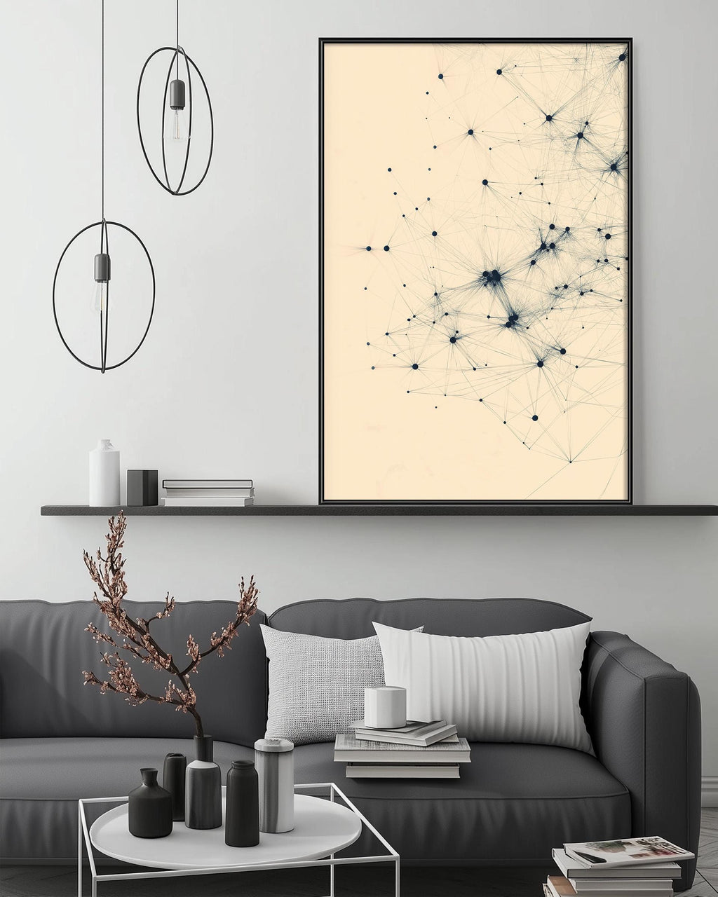 a modern living room with a gray sofa, a coffee table, and a large abstract painting hanging on the wall above the sofa.