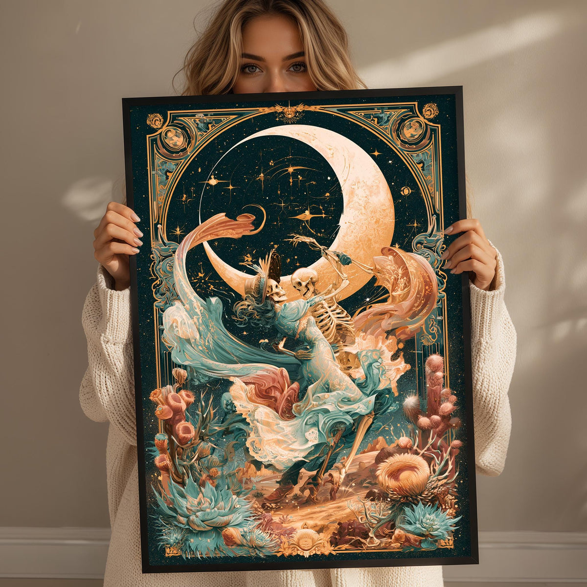 A woman holds up a framed artwork depicting a fantastical scene with a crescent moon, stars, and a woman with a crescent moon on her head.
