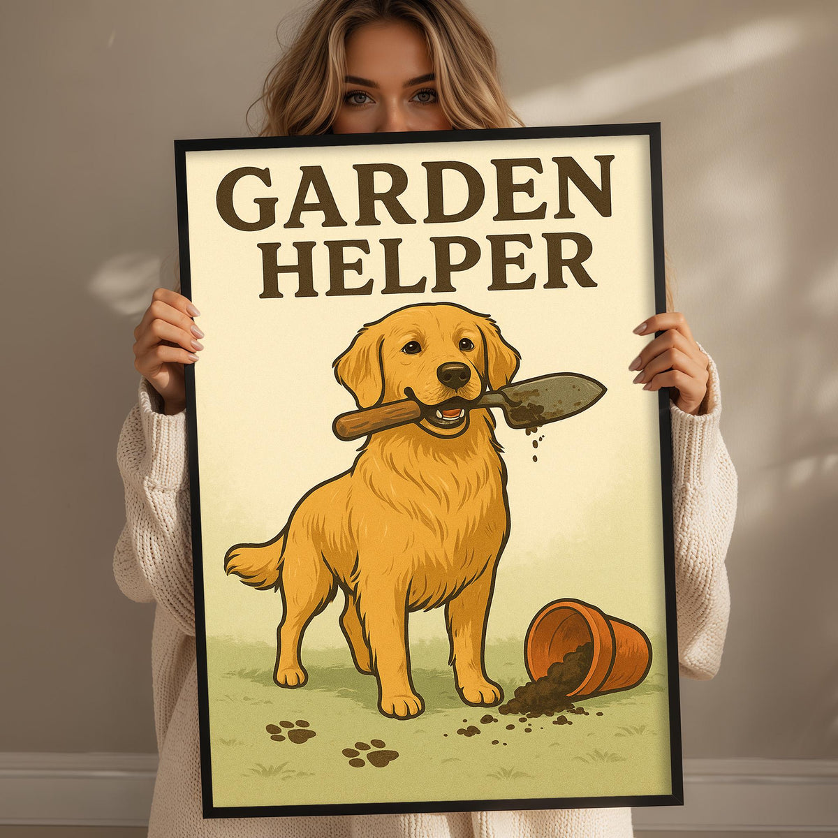 A woman holds a framed poster featuring a cartoon dog holding a shovel and standing in a garden.