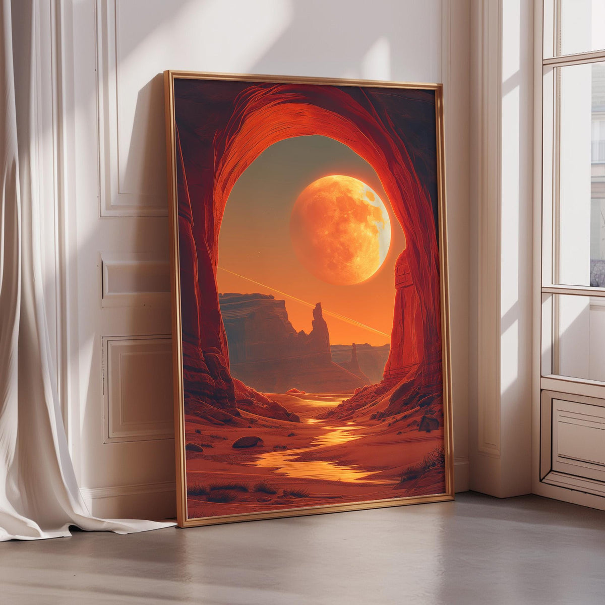 a large, framed painting depicting a desert landscape with a large, bright orange moon in the sky.