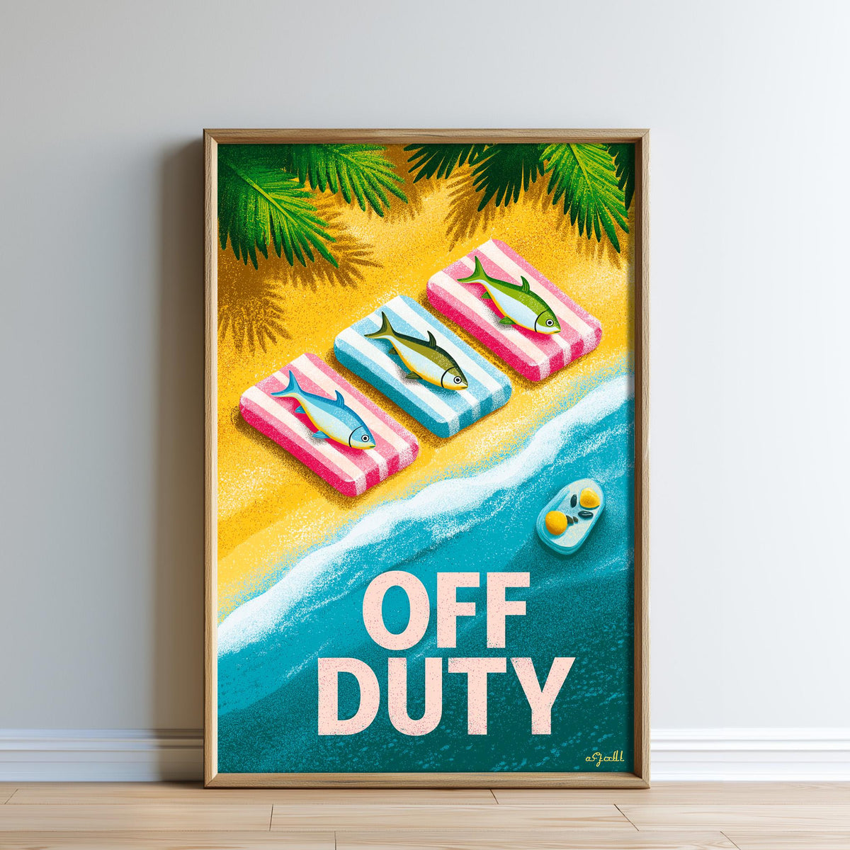 The image is a framed poster with a beach scene and three fish on colorful towels. The text "OFF DUTY" is prominently displayed in the center of the poster.