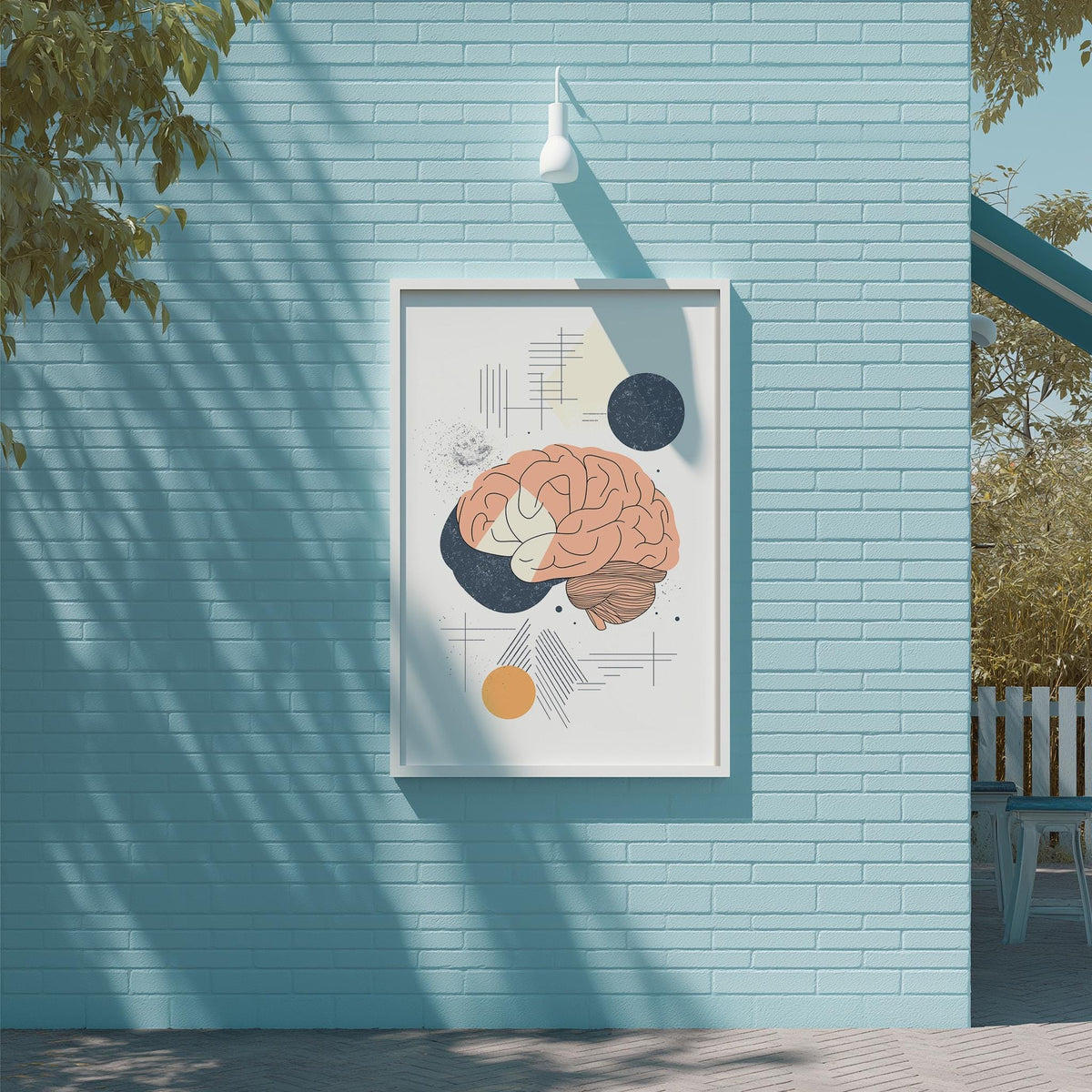 a blue brick wall with a framed illustration of a brain and geometric shapes hanging on it.