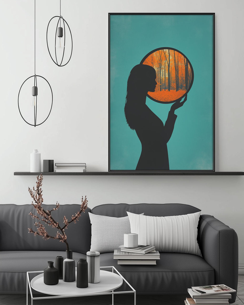 a modern living room with a gray sofa, a coffee table, and a large framed artwork depicting a silhouette of a person holding a tree branch with orange leaves.