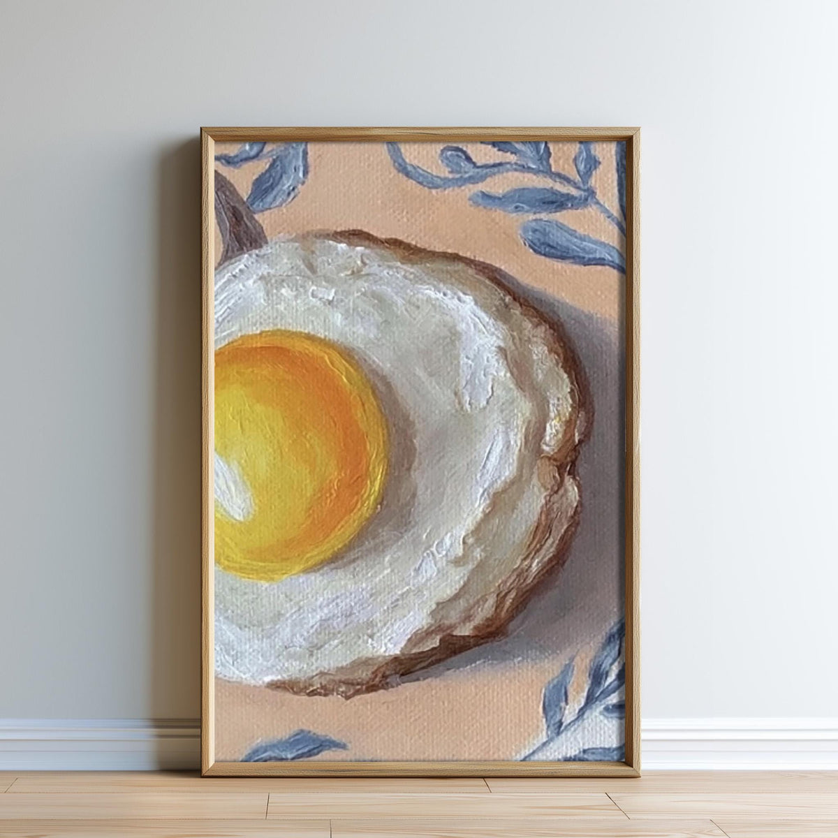 The image is a framed painting depicting a fried egg on a piece of toast.
