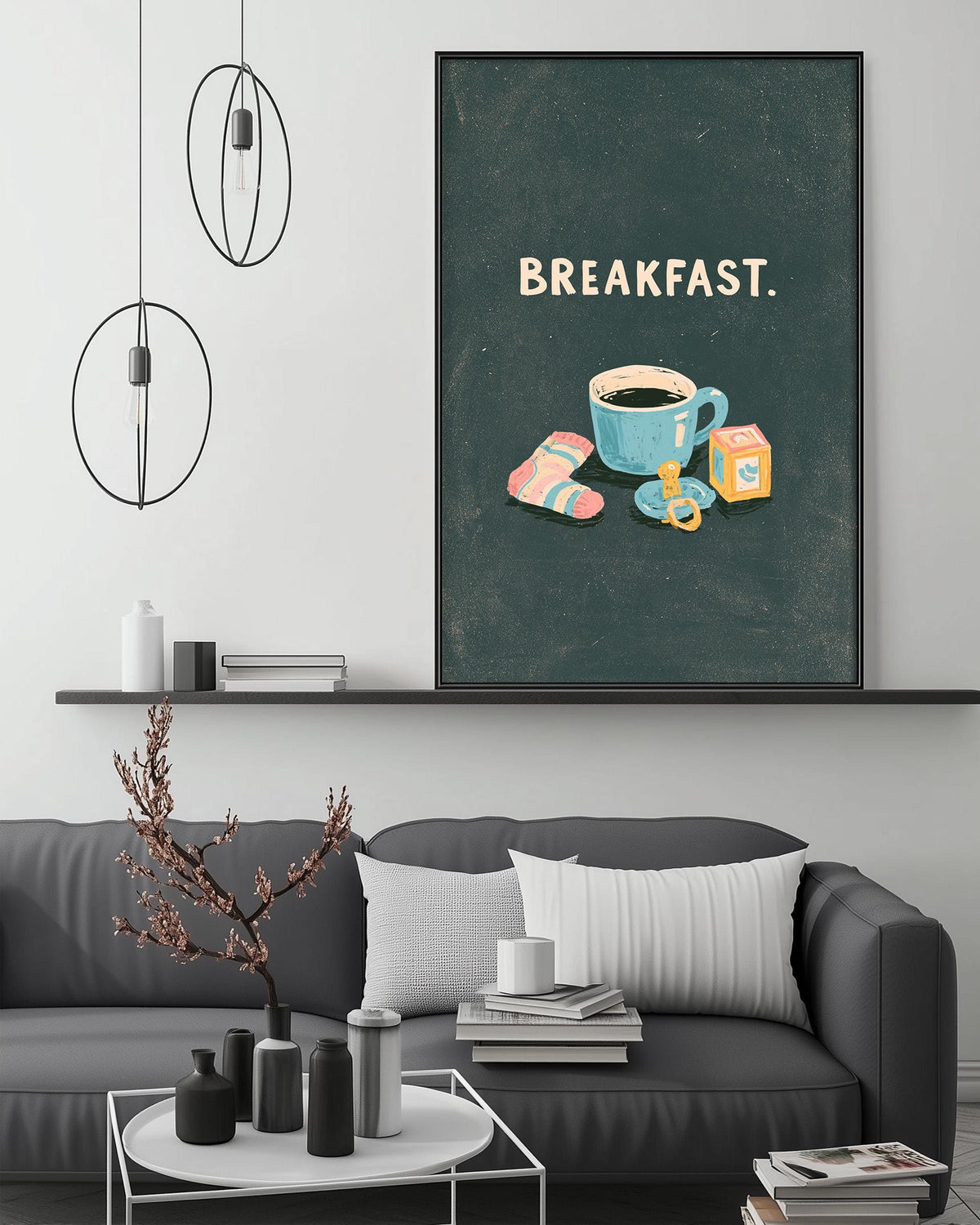 a cozy living room with a gray couch, a coffee table, and a large framed poster of a cup of coffee and breakfast items on the wall.