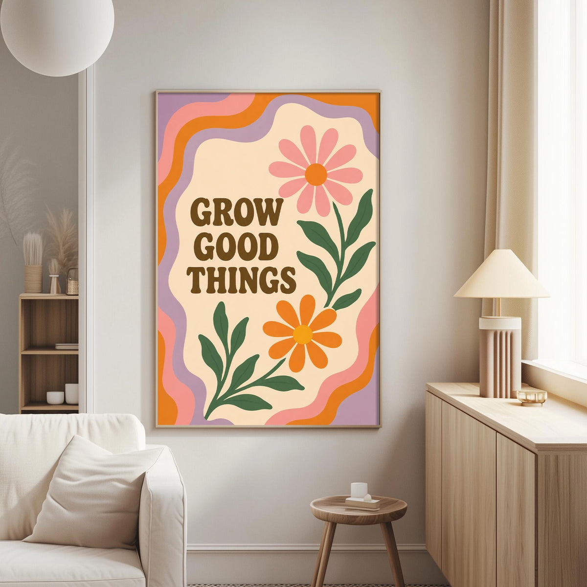 a poster with the text "GROW GOOD THINGS" and colorful floral designs on a wall in a living room setting.