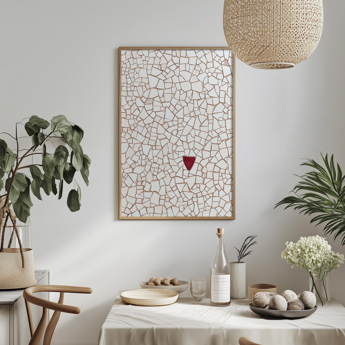 a dining area with a table set for a meal, a potted plant, a hanging light fixture, and a framed artwork on the wall.