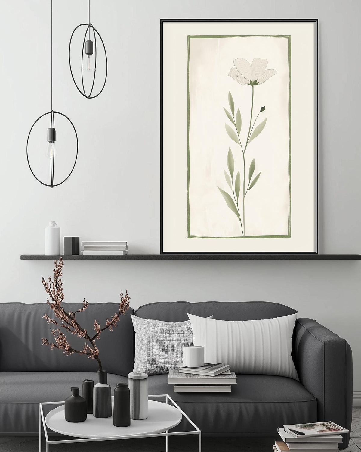 a modern living room with a gray sofa, a coffee table, and a large framed print of a flower on the wall.