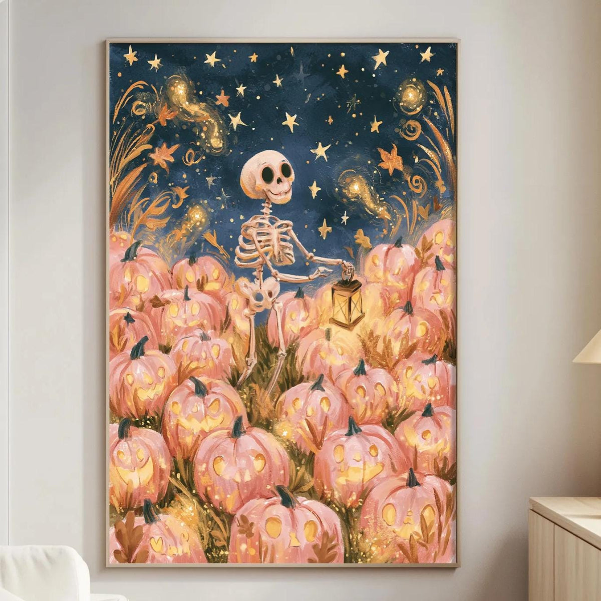 a living room with a large framed artwork hanging on the wall depicting a skeleton holding a lantern amidst a field of pumpkins.