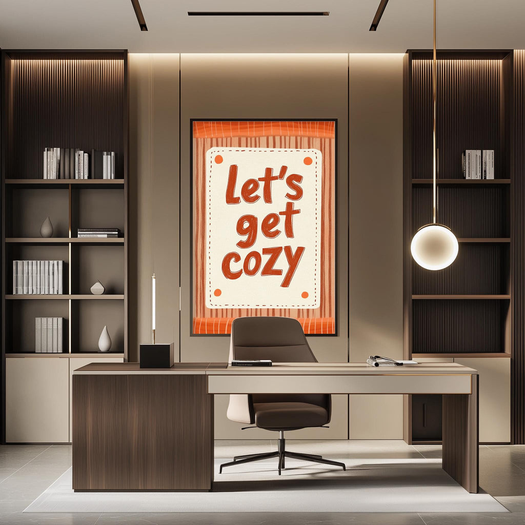 a modern office space with a desk, chair, and bookshelves. A large orange poster with the text "Let's get cozy" is displayed on the wall above the desk.