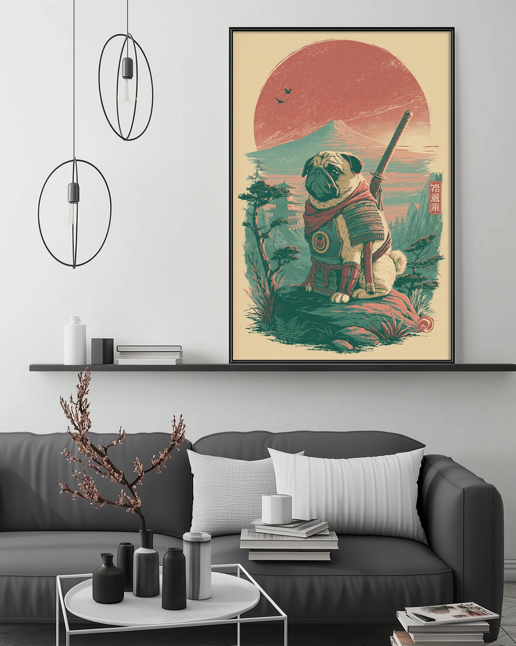 a large framed artwork depicting a pug dog in a warrior costume, sitting on a rock and holding a sword, set against a sunset landscape. The artwork is displayed on a wall above a gray couch, which has a coffee table and various decorative items on it.