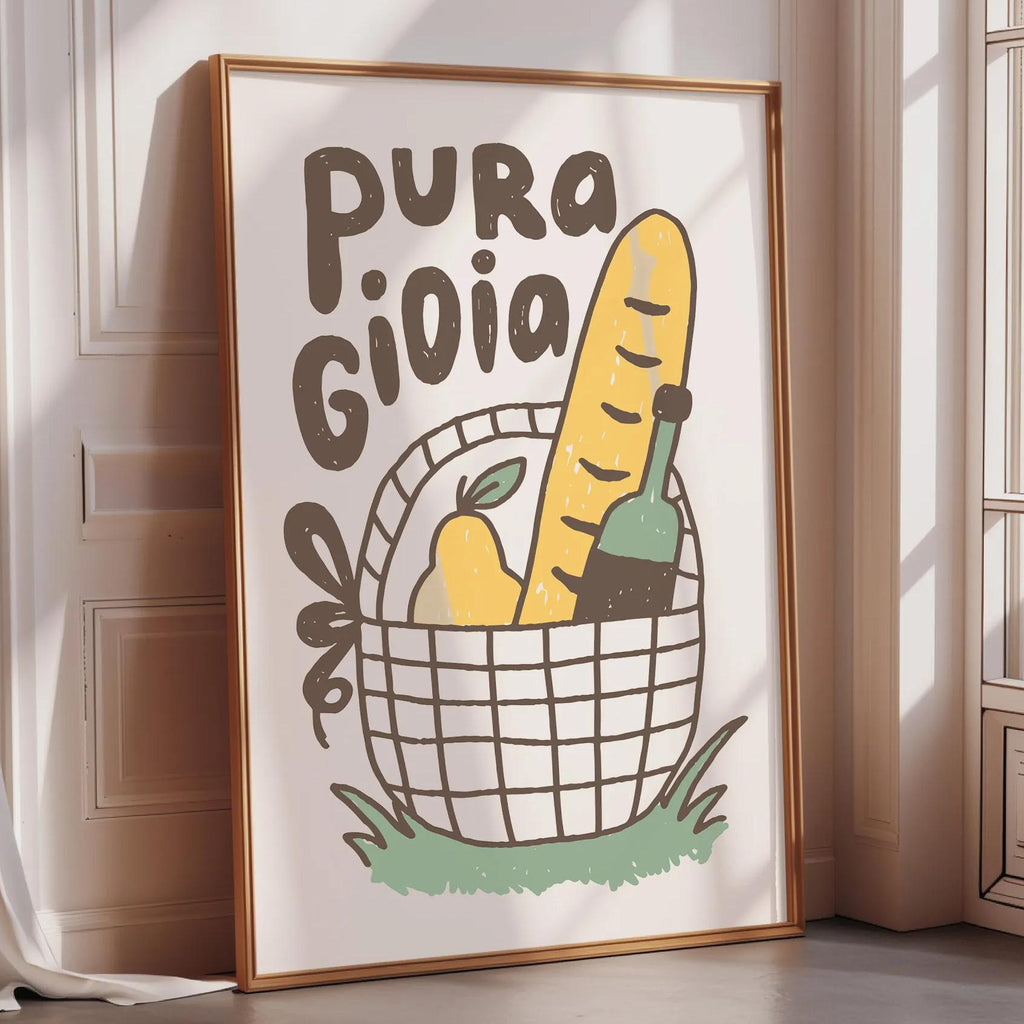 A framed poster with a basket of food and the text "PURA GIOLA" on it, placed on a wooden floor next to a window.