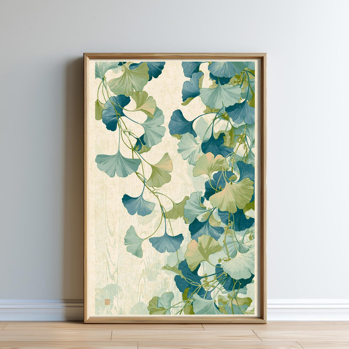 a framed print of a vibrant, leafy plant with a mix of green and blue hues, creating a lush and natural atmosphere.