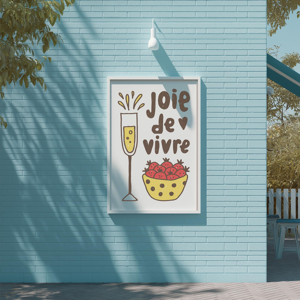 a blue wall with a framed poster that includes a wine glass and a bowl of strawberries.