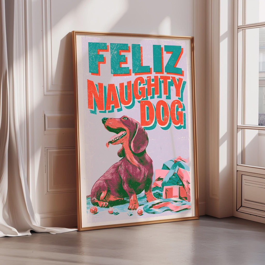 a framed poster with a large, colorful illustration of a dog and the text "Feliz Naughty Dog" on it.
