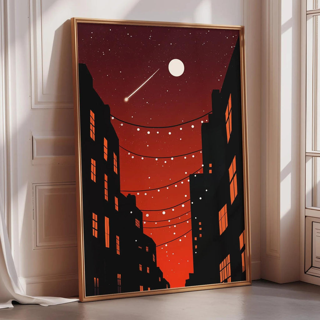 a framed poster of a cityscape at night, with a full moon and a shooting star in the sky.