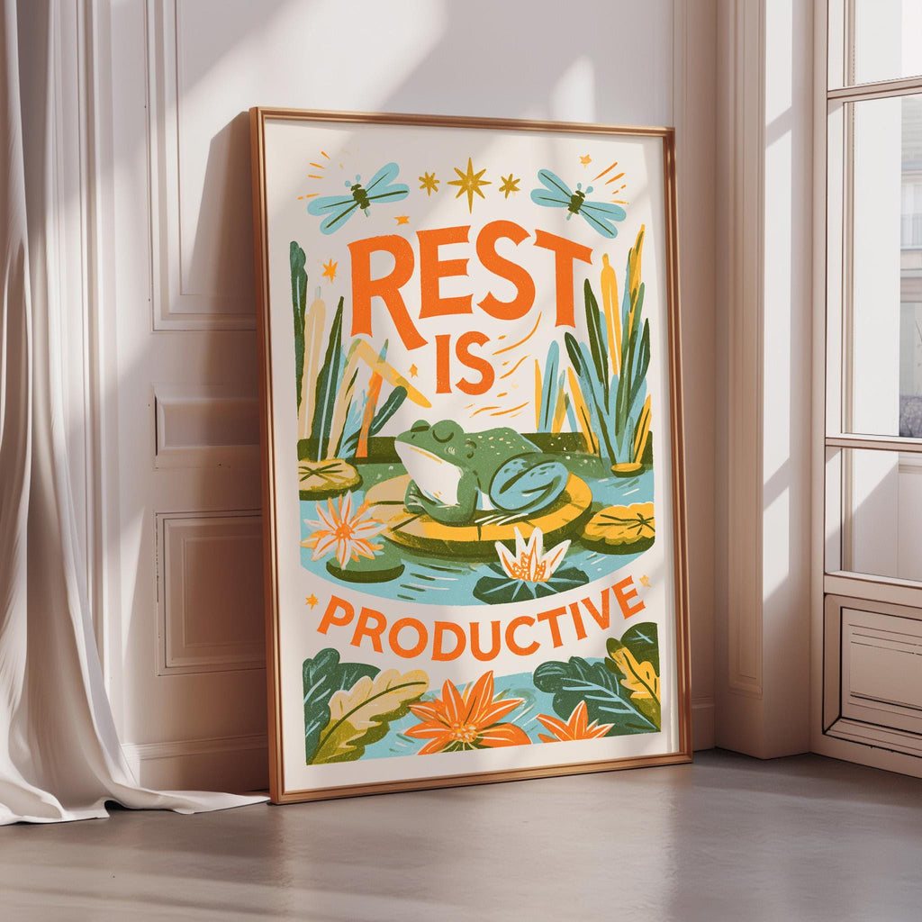 a poster with a frog sitting in a pond surrounded by flowers and plants, with the text "REST IS PRODUCTIVE" displayed prominently.