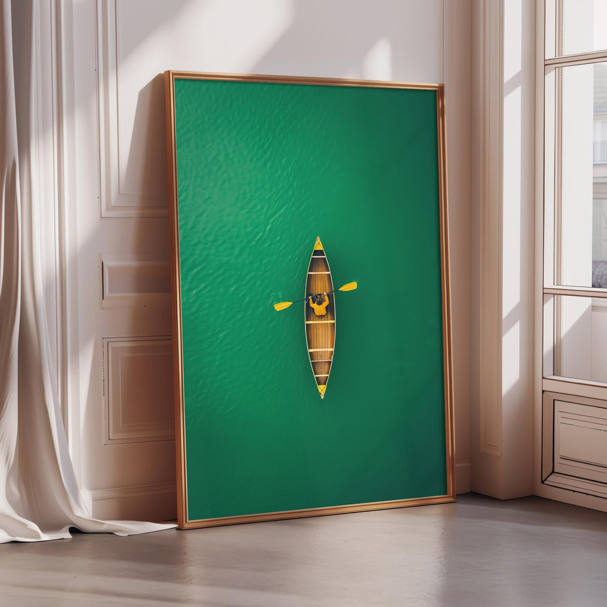 A large framed artwork depicting a canoe on a green background, with a window and white curtain in the background.