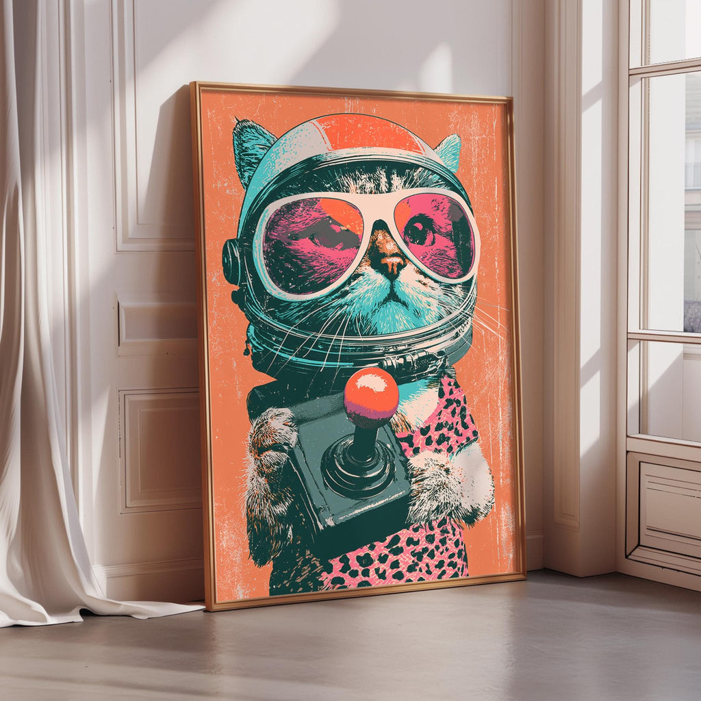 A framed poster depicting a cat wearing a helmet and holding a camera, with a vibrant and colorful design.
