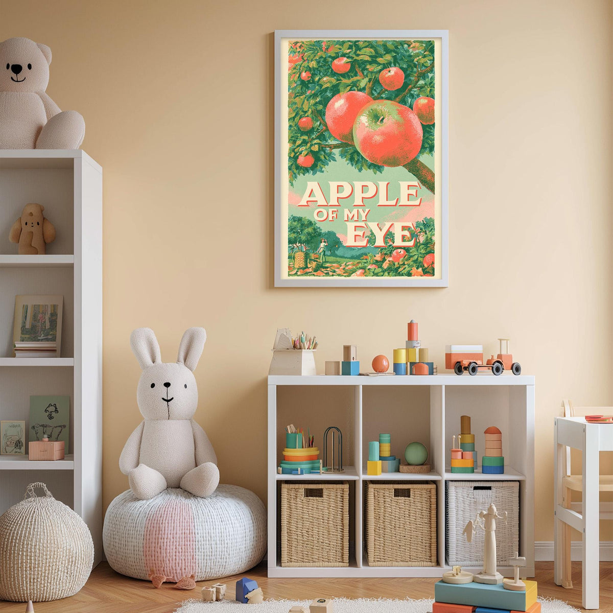 A child's bedroom with a large framed poster of an apple tree on the wall, a white bookshelf filled with toys, and a white bean bag chair.