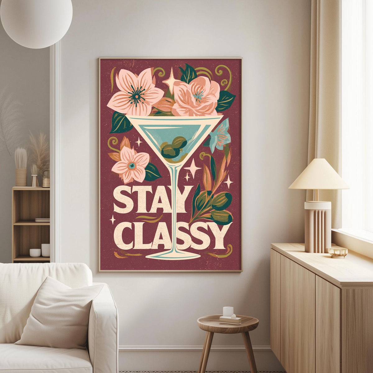 a large framed poster with a floral design and the text "STAY CLASSY" on it, hanging on a wall in a living room.