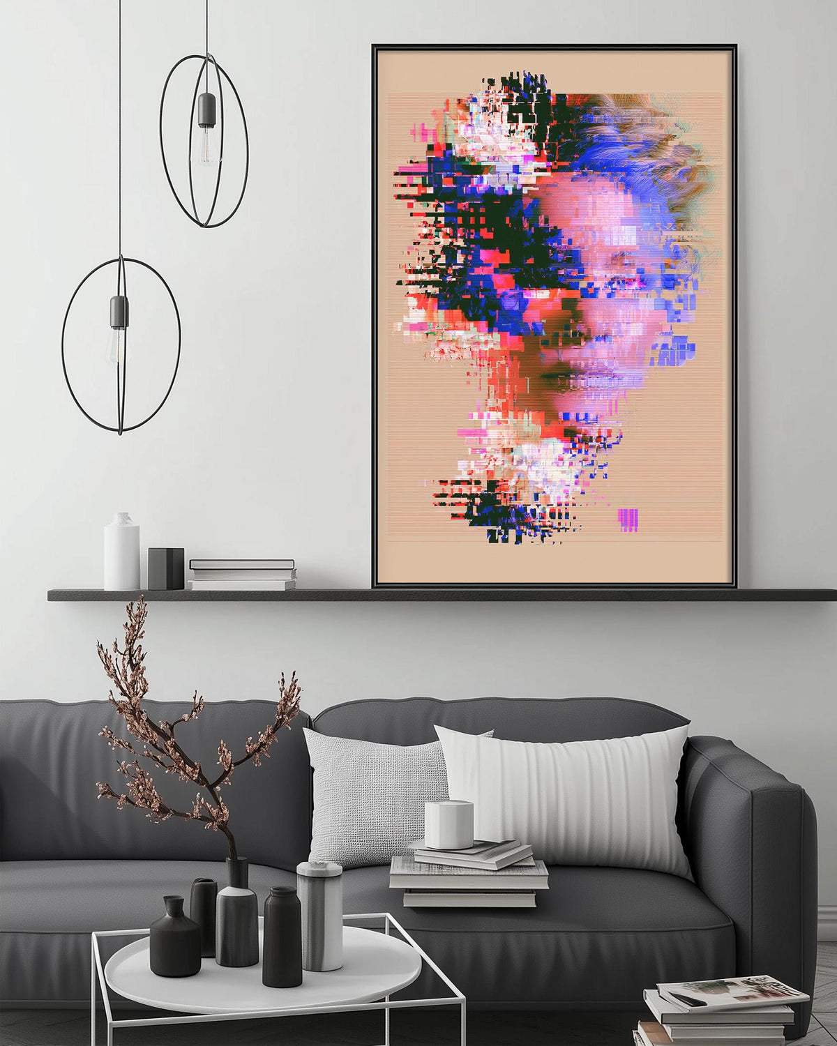a modern living room with a gray sofa, a coffee table, and a large abstract painting hanging on the wall above the sofa.