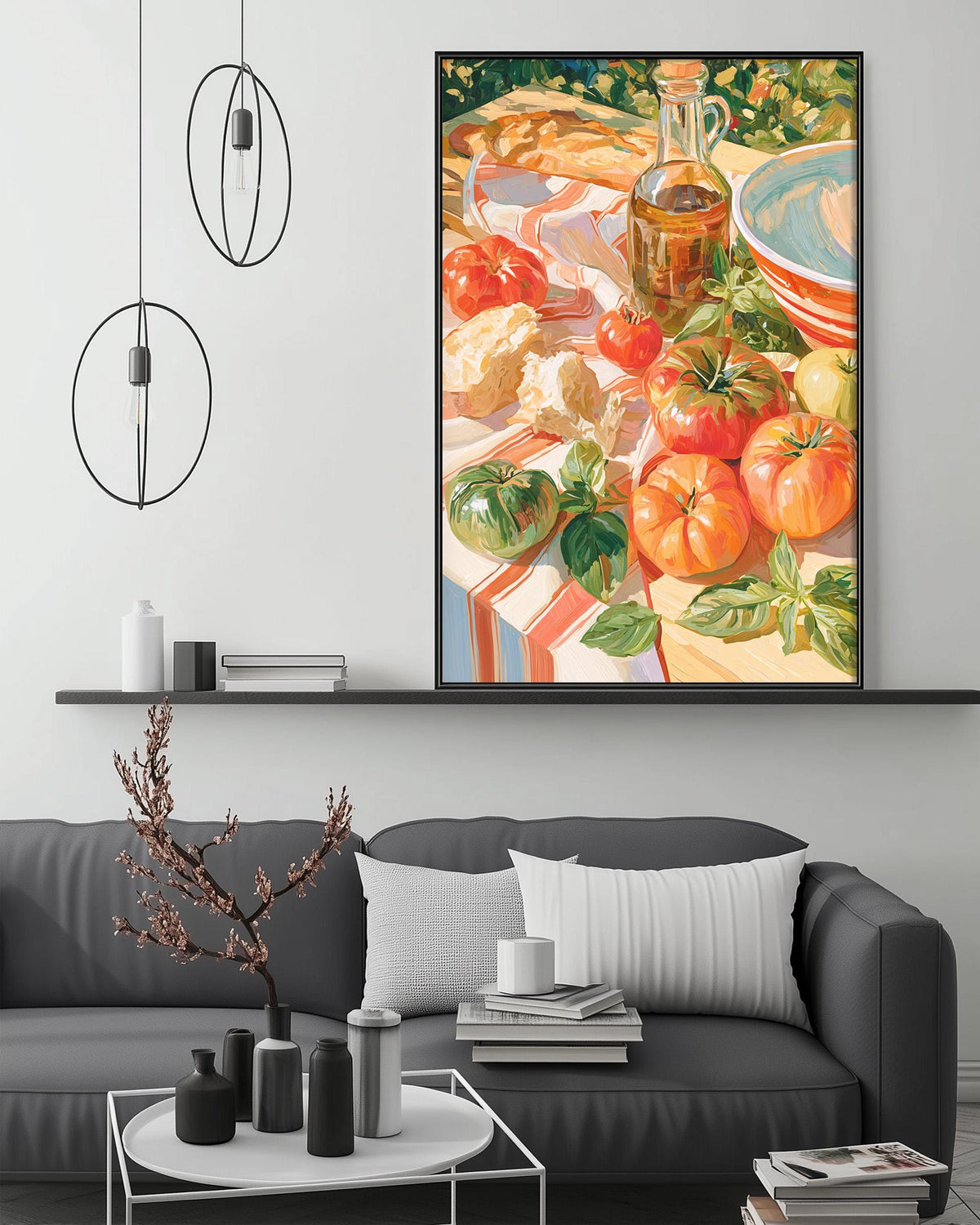 a large painting of a table with various food items, including tomatoes, bread, and other vegetables, hanging on a wall above a gray couch in a living room setting.